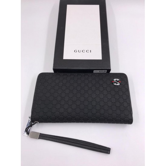 Кожаный кошелёк Gucci с тиснением