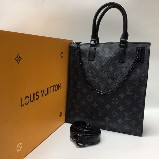 Сумка Louis Vuitton с бегунком на цепочке