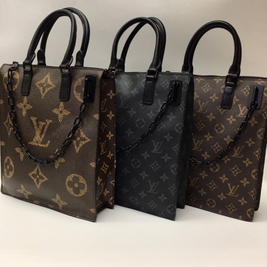 Сумка Louis Vuitton с бегунком на цепочке