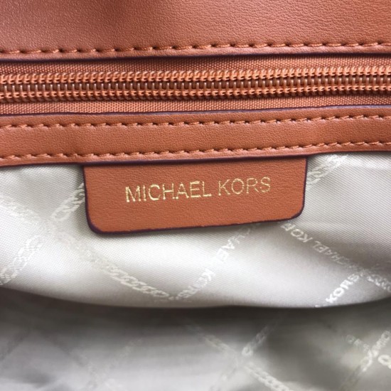 Сумка через плечо Michael Kors с паттерном MK розовая